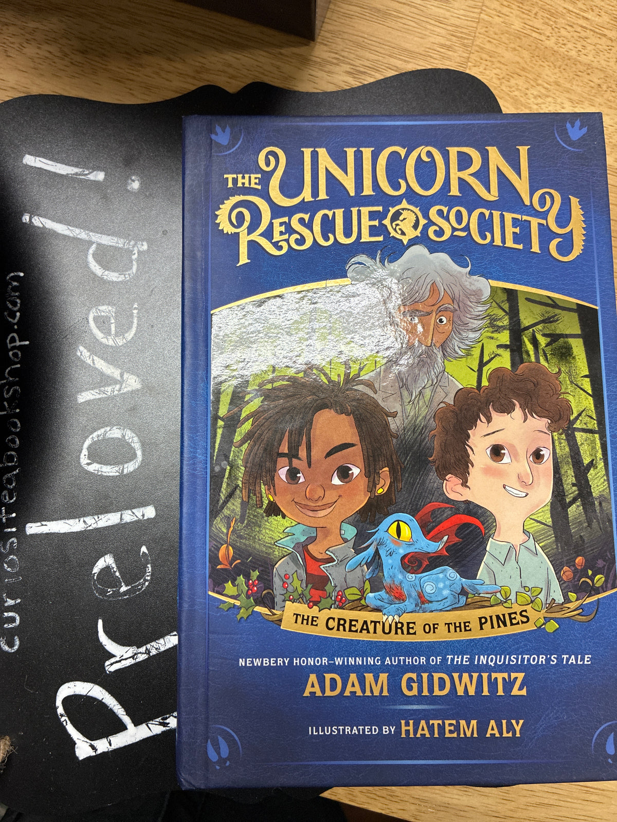 Preloved: The Creature of the Pines (The Unicorn Rescue Society)